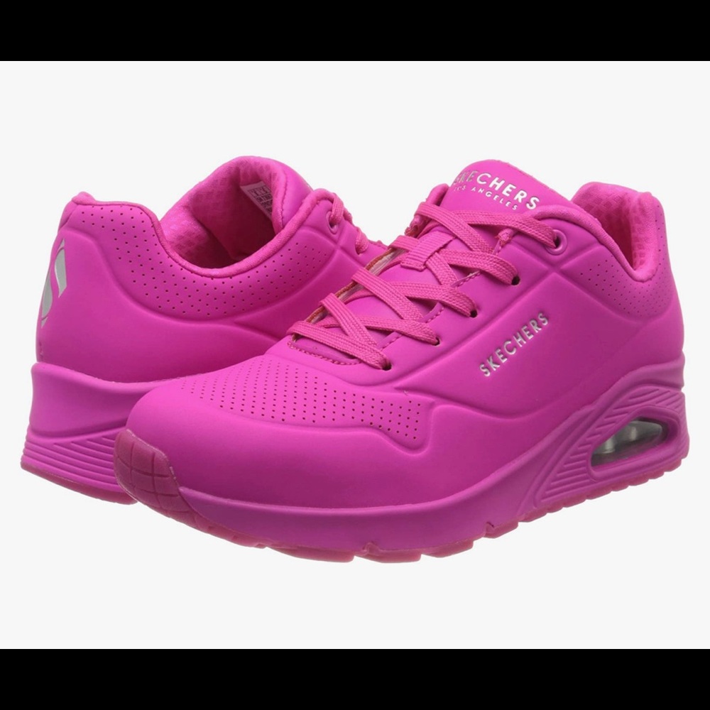 Bright pink Skecher sneakers